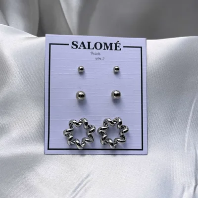 Aretes Rueda Plateada de acero inoxidable - no se oxidan - Joyería Salomé Quito